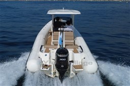 2026 Brig Eagle 8 boat cruising on open water, rear view with powerful engine.
