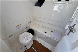 Interior cabin of 2026 Brig Eagle 8 boat, featuring storage and safety equipment.