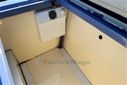 Storage compartment of 2010 Isloep Rapida 990 boat with Waeco cooling unit.