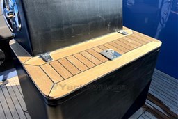 Isloep Rapida 990 boat detail, featuring wooden deck and metal fittings, 2010 model.