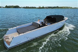 Isloep Rapida 990 boat cruising on a lake, 2010 model.