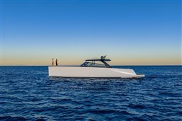 2025 VanDutch 75 yacht cruising on open sea at sunset.