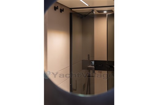 Interior of 2025 VanDutch 75 yacht, featuring sleek, modern bathroom design.