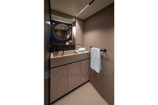Luxurious bathroom interior of 2025 VanDutch 75 yacht with modern design and elegant fixtures.