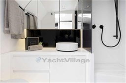 Modern bathroom interior on 2025 VanDutch 48 yacht, featuring sleek design and elegant fixtures.