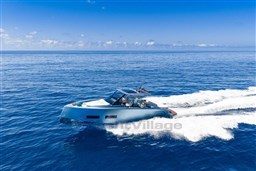2026 Pardo Yachts 43 cruising on open blue ocean under clear sky.