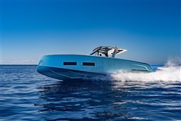 2026 Pardo Yachts 43 cruising on open water under clear blue sky.