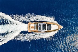 Aerial view of 2026 Pardo Yachts 43 cruising on vibrant blue ocean.