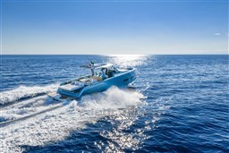 2026 Pardo Yachts 43 cruising on open sea under clear blue sky.