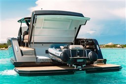 2025 Pardo Yachts 50 with tender, cruising in clear turquoise waters.