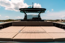 2025 Pardo Yachts 50 with spacious sunbathing deck under clear blue sky.