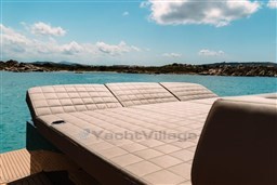 Luxurious sunbed on 2025 Pardo Yachts 50, overlooking serene turquoise waters.