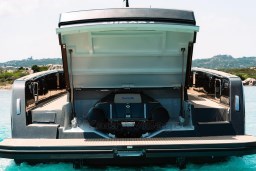 2025 Pardo Yachts 50 with open rear compartment on clear water.