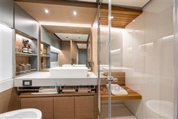 Luxurious bathroom interior of 2025 Pardo Yachts GT75 with modern fixtures and wooden accents.