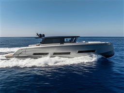 2025 Pardo Yachts GT75 cruising on open sea under clear blue sky.