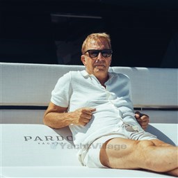 Man relaxing on Pardo Yachts GT75, 2025 model, wearing sunglasses and white attire.