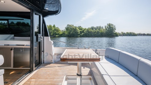 2024 Apreamare GOZZO 38 CABIN yacht with elegant deck, lake view, and modern seating.