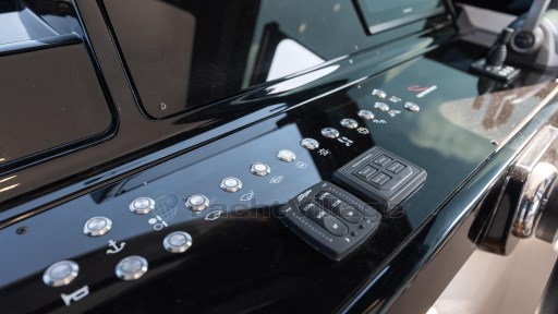 Control panel of 2024 Apreamare GOZZO 38 CABIN yacht, featuring modern buttons and switches.