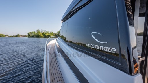 2024 Apreamare GOZZO 38 CABIN yacht on serene water, showcasing sleek design.