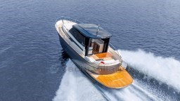 2024 Apreamare GOZZO 38 CABIN cruising on open water, showcasing sleek design and luxury.