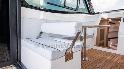 2024 Apreamare GOZZO 38 CABIN interior with white seating and wooden flooring.