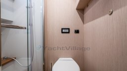 Modern bathroom in 2024 Apreamare GOZZO 38 CABIN yacht, featuring sleek design and wood accents.