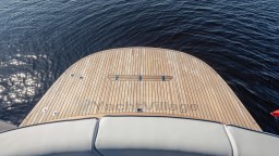 2024 Apreamare GOZZO 38 CABIN yacht with teak deck on calm water.