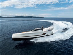 2024 Wider Wilder 60 yacht cruising on open sea, creating a dynamic water trail.