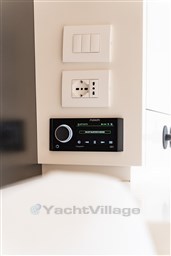 Control panel and outlets on 2024 VanDutch 40 yacht interior.