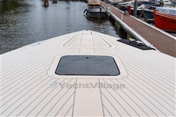 2024 VanDutch 40 yacht deck, sleek design, docked at marina.