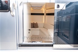 2024 VanDutch 40 yacht interior with modern seating and ambient lighting.