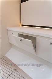 2024 VanDutch 40 yacht interior with sleek white cabinetry and modern design.