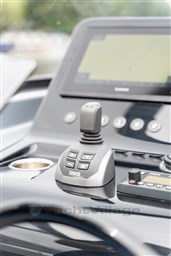 Control panel of 2024 VanDutch 40 yacht with joystick and display.