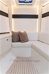 Luxurious interior of 2024 VanDutch 40 yacht with modern seating and ambient lighting.