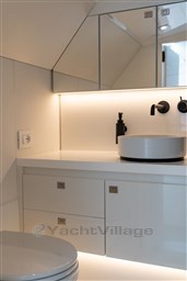 Modern bathroom interior on 2024 VanDutch 40 yacht, featuring sleek design and ambient lighting.