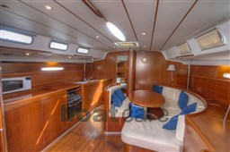 beneteau first 47.7 interior sofa and kitchen different angle.jpg