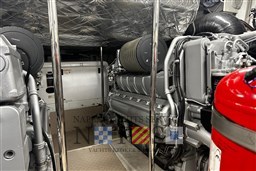 Engine room of 2009 Pershing 72 yacht, featuring advanced machinery and equipment.