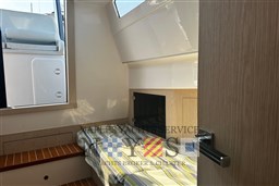 Interior cabin of 2020 Magazzu MX 13 Gran Coupè with bed and window.