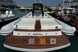 2020 Magazzu MX 13 Gran Coupè luxury yacht docked at marina, showcasing sleek design.