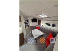 Luxurious interior of 2024 Itama 62 RS yacht with modern seating and decor.