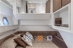 Luxurious interior cabin of 2024 Itama 62 RS yacht with modern design elements.