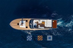 Aerial view of 2024 Itama 62 RS yacht cruising on open water.
