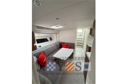 Luxurious interior of 2024 Itama 62 RS yacht with modern seating and elegant design.