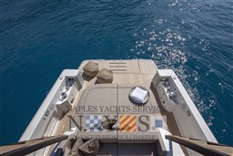 Luxurious 2022 Bluegame BG 42 yacht deck with sun loungers and ocean view.